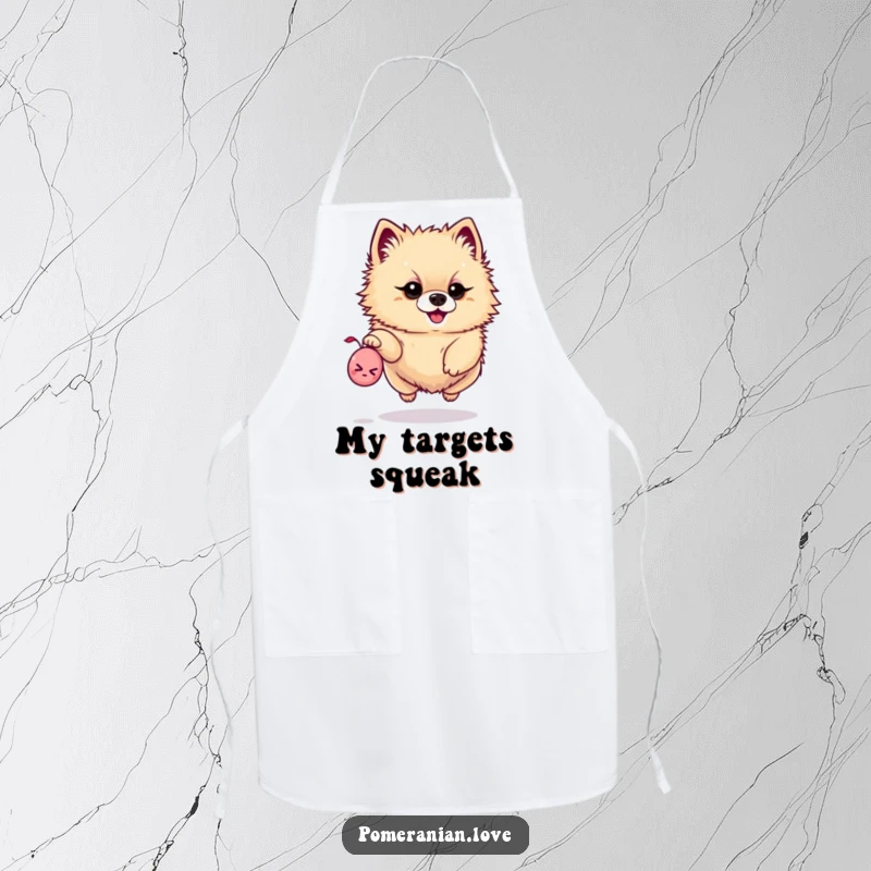 Funny apron featuring a determined Pomeranian leaping for a tiny squeaky toy, perfect for playful cooks.