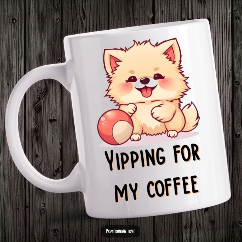 Funny mug depicting a joyful Pomeranian with a happy expression, actively playing with a colorful bouncy ball.