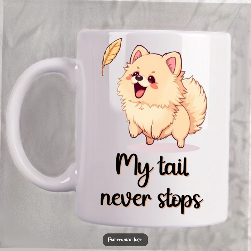 Funny mug featuring an excited Pomeranian dog wagging its tail vigorously, trying to catch a delicate falling feather.