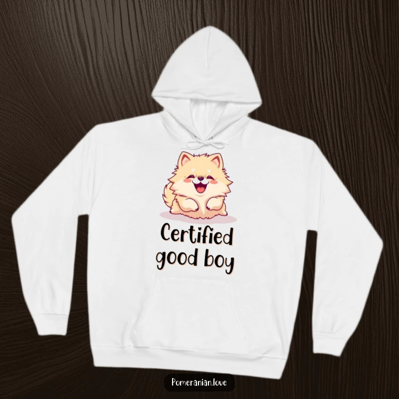 Funny Pomeranian dog rolling over with a joyful yip on a cozy hoodie, perfect for chilly days.