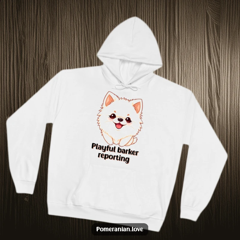 Funny Pomeranian hoodie featuring a dog with perky ears barking playfully, radiating warmth and joyful sound.