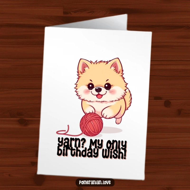 Funny Free Printable Pomeranian Birthday Card: Adorable dog with focused eyes chasing a yarn ball, ready to party.