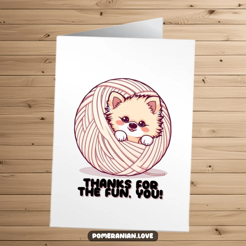 Funny Free Printable Thank You Card featuring a mischievous Pomeranian dog peeking from behind a large yarn ball.