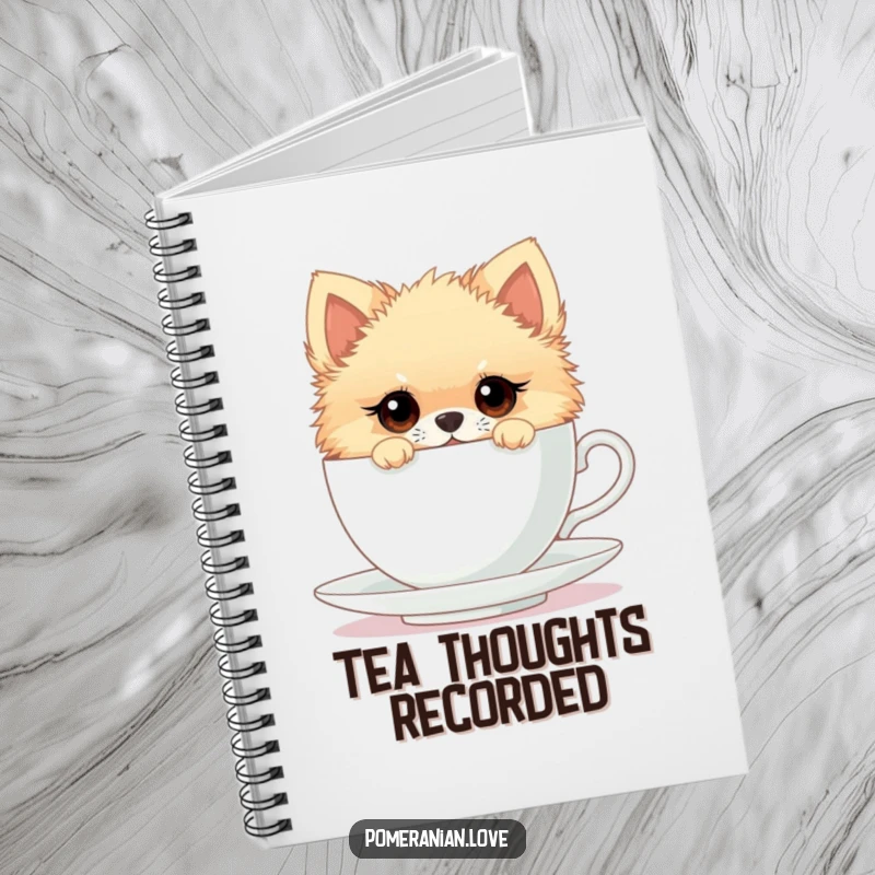 Funny notebook with a Pomeranian peeking from a teacup, ideal for capturing curious thoughts and observations with a touch of humor.
