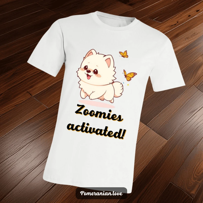 Funny playful Pomeranian t-shirt, a cute dog gleefully chasing a butterfly, ideal for a funny gift.
