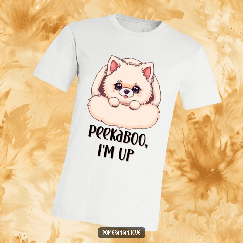 Funny Pomeranian t-shirt, a fluffy dog peeking out from a cozy bed, eyes bright and curious, inviting a smile.