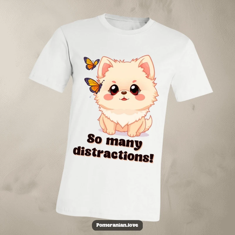 Funny Pomeranian t-shirt depicting a dog with wide eyes watching a butterfly flutter past. Captures a moment of pure curiosity and fascination.