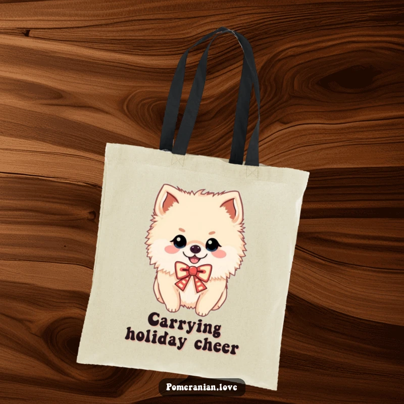 Funny tote bag featuring a cheerful Pomeranian with a festive bow, perfect for carrying items, a gift.