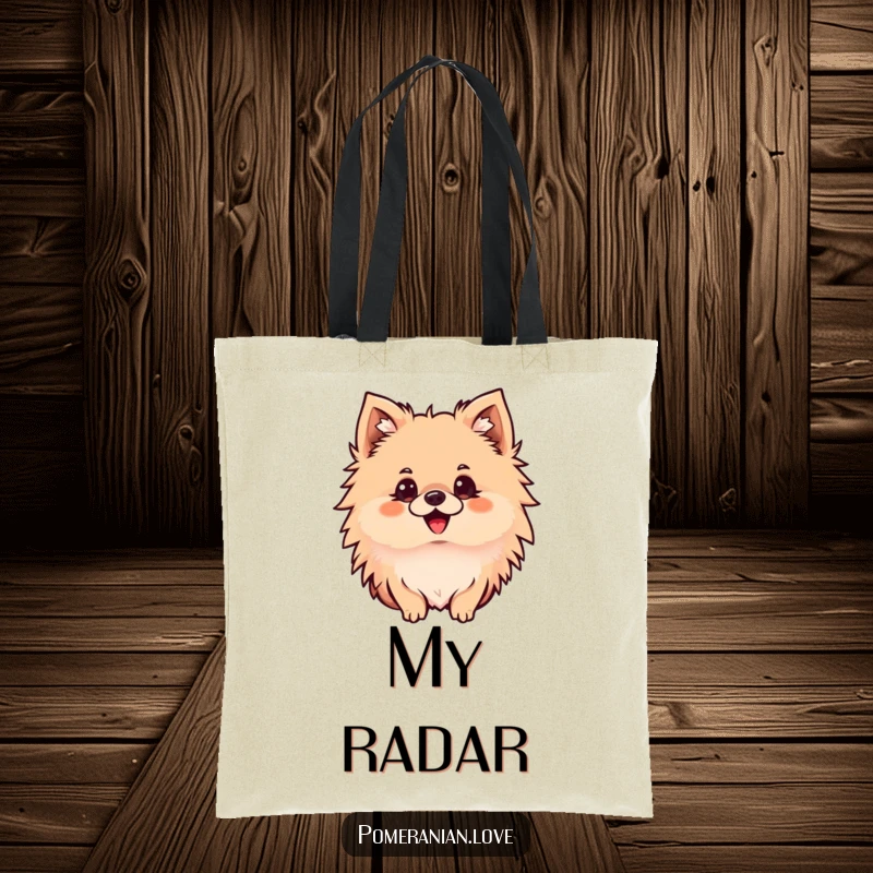 Funny Pomeranian tote bag showing a delighted dog with ears perked, looking intently, perfect for carrying your discoveries with style.